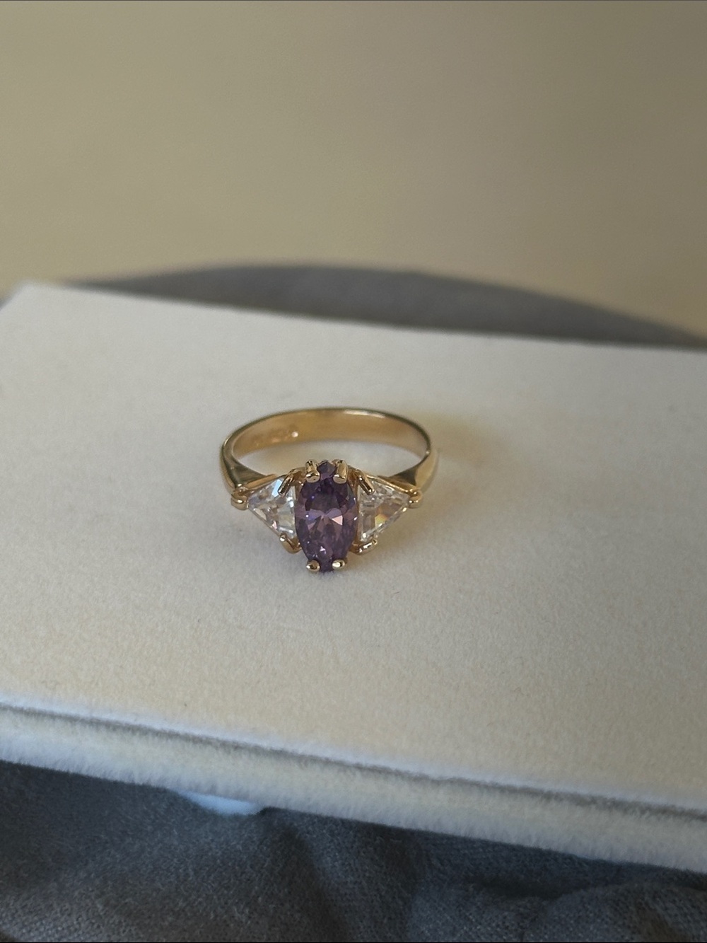 Gold Ring with Purple Amethyst Stone and Side Accents